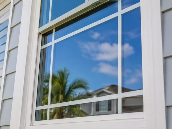 After: the same window cleaned crystal-clear and streak-free